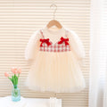 Girls Cream Tulle Party Dress with Red Bow Details – Elegant Special Occasion Outfit